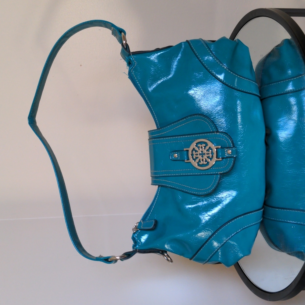 Teal medallion shoulder bag
